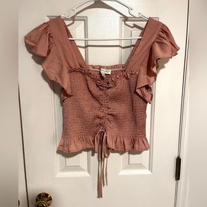 Light pink ruffle top